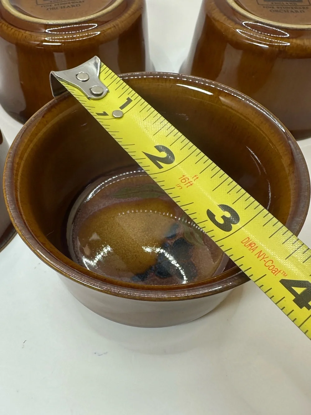 Set of 4 Denby Orchard Stoneware Ramekins feature a glossy brown Glaze.